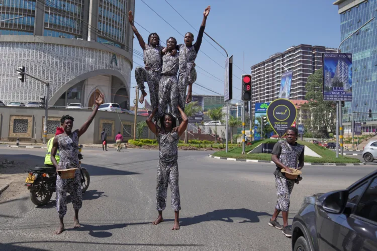 Street acrobats entertain motorists stuck in the Kenyan capital's notorious traffic